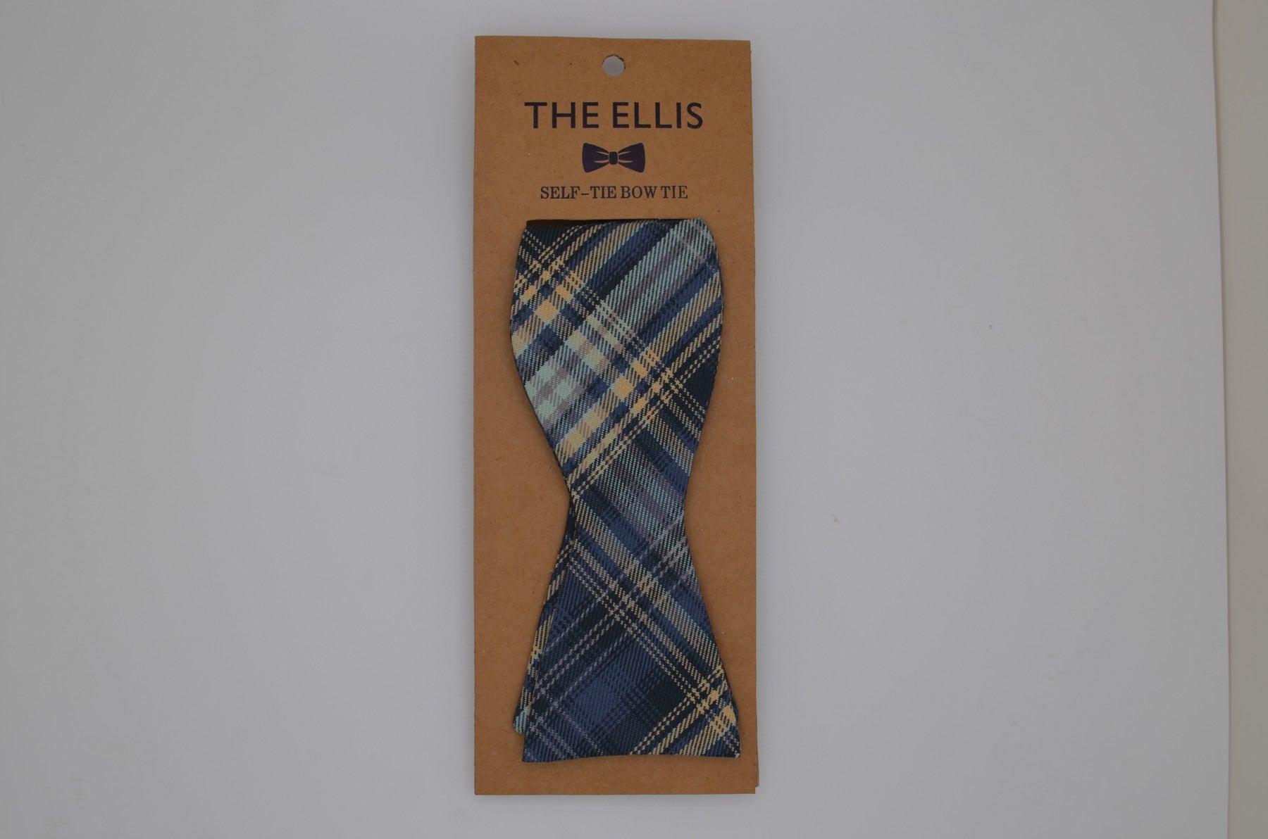 Blue plaid self-tie bow tie on Ellis packaging