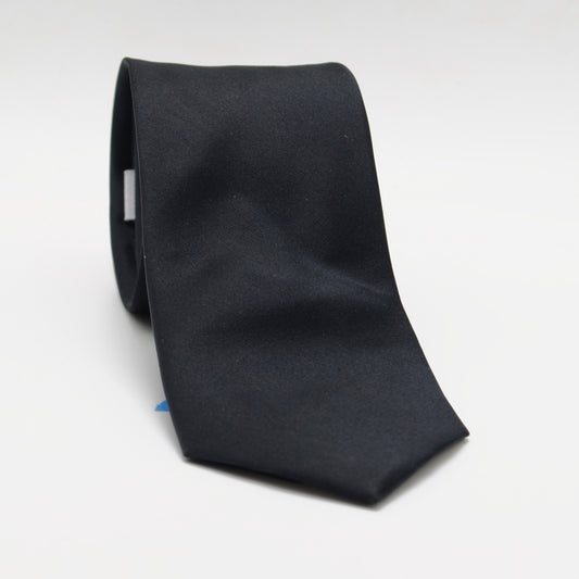 Black Silk Necktie rolled on a light background