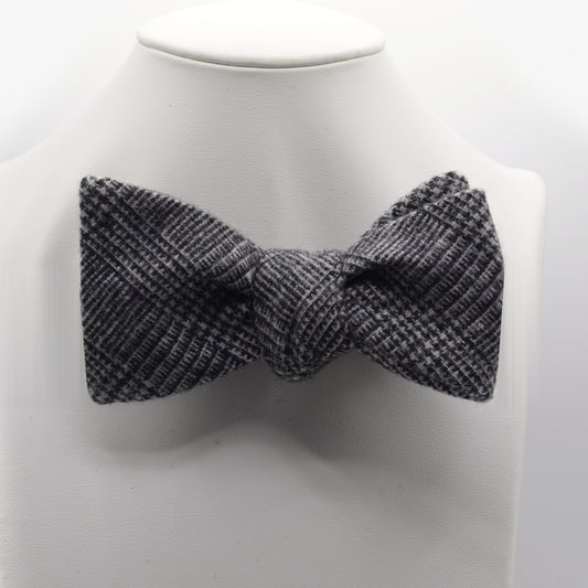Charcoal Textured Check Bow Tie shown on a white display stand
