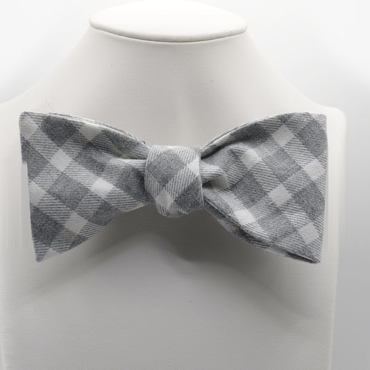 Gray Gingham Bow Tie shown on a white display stand