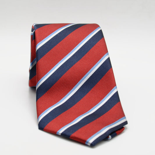 Red and Navy Stripe Necktie rolled on a light background